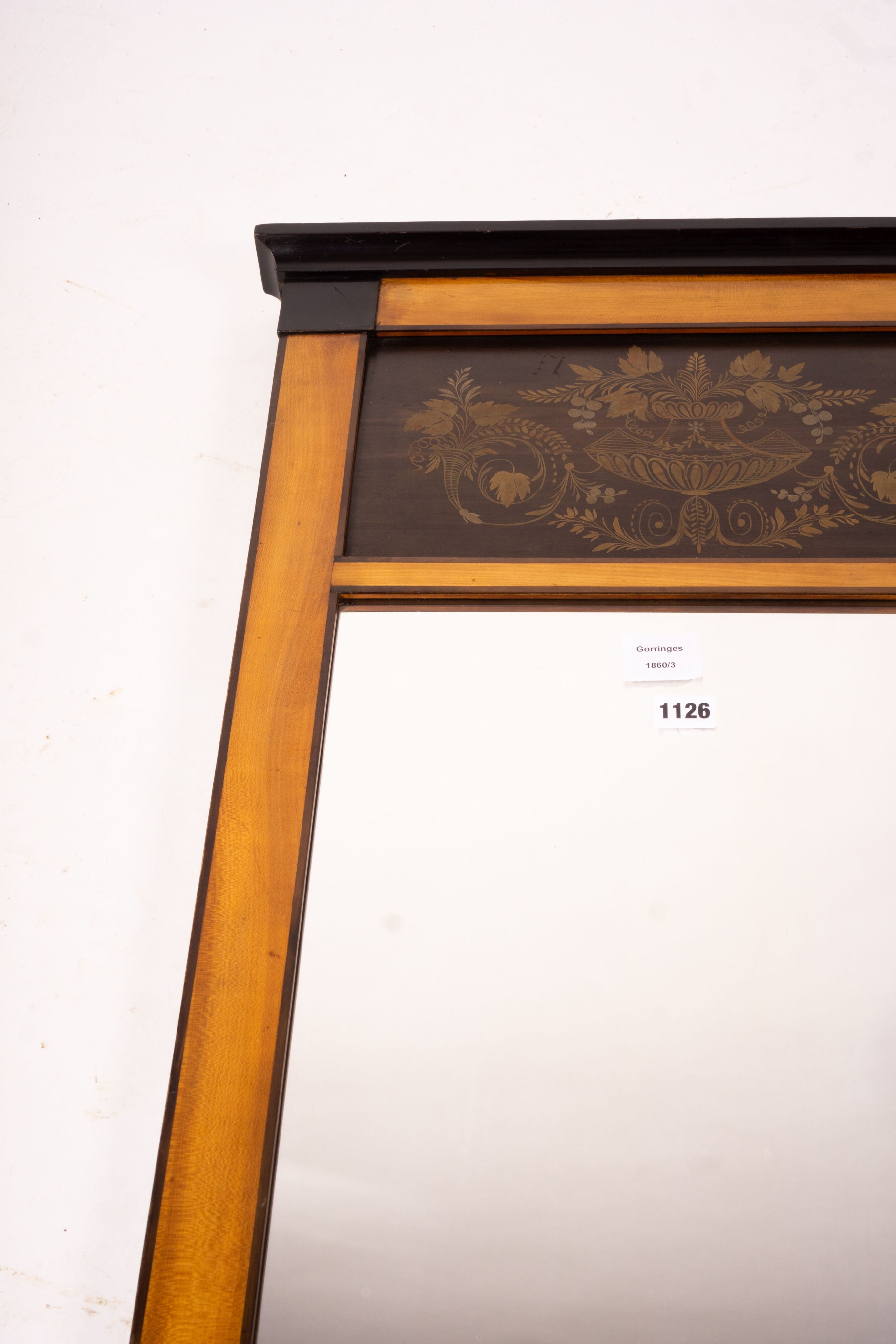 A Biedermeier style mirror with stencil decoration, width 51cm, height 109cm